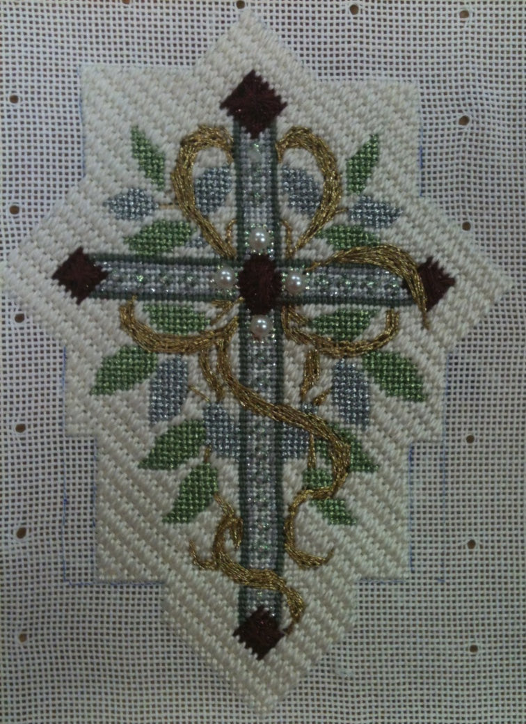 Silver cross with pearls