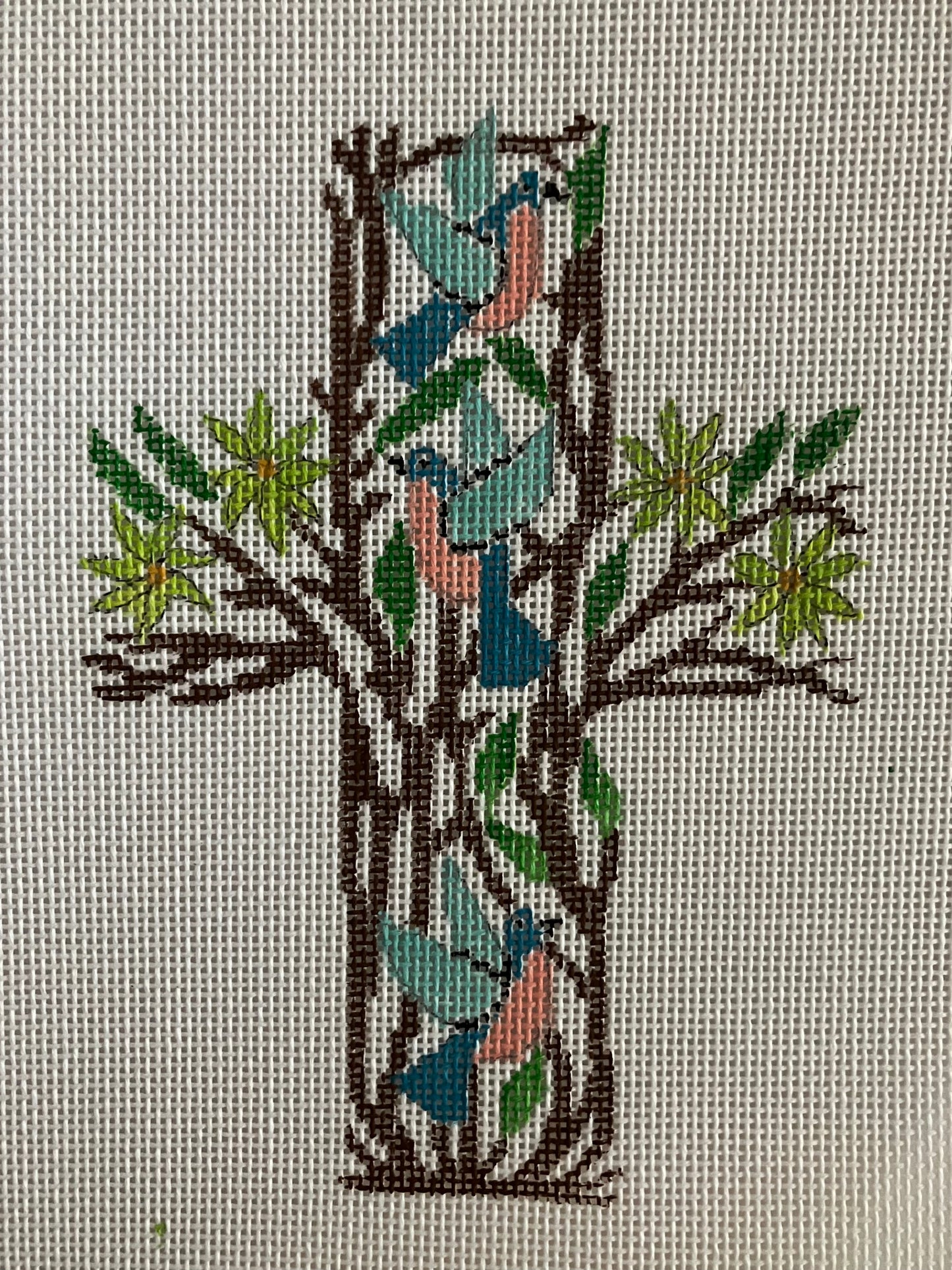 Cross with birds and twigs