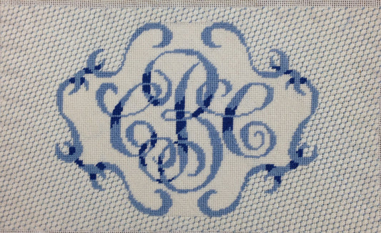 Monogram with scroll border and stitch guide